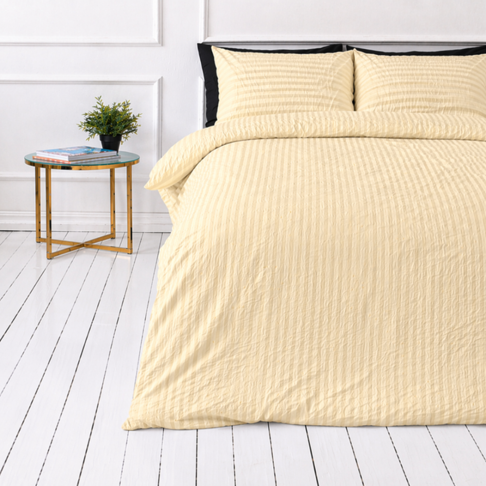 Pussilakanasetti „Kora Yellow“. Yksivärinen pussilakana, 140x200 cm, 150x210 cm, 160x200 cm, 180x200 cm, 200x200 cm, 200x220 cm, 230x220 cm. Kermansävyinen vuodevaatesetti mukavaan uneen.