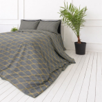 Pussilakanasetti „Cross“. Harmaa pussilakanasetti, 140x200 cm, 150x210 cm, 160x200 cm, 180x200 cm, 200x200 cm, 200x220 cm. Elegantti harmaan sävyinen vuodevaatesetti vaaleanruskeilla ja hiekanvärisillä ovaalikuvioilla – kodikas ja moderni design.