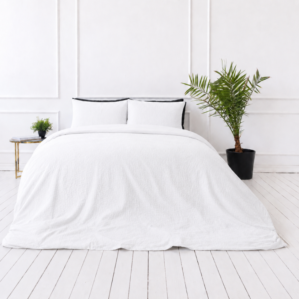 Musliini pussilakanasetti „White muslin“. Yksivärinen pussilakana, 200x200 cm, 200x220 cm. Minimalistinen valkoinen pussilakanasetti kevyellä musliinirakenteella