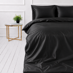Silkkiset vuodevaatteet „Onyx Silk“. Yksivärinen pussilakana, 200x220 cm. Luksusmainen musta silkkipussilakanasarja syvällä kiillolla ja pehmeillä laskoksilla.